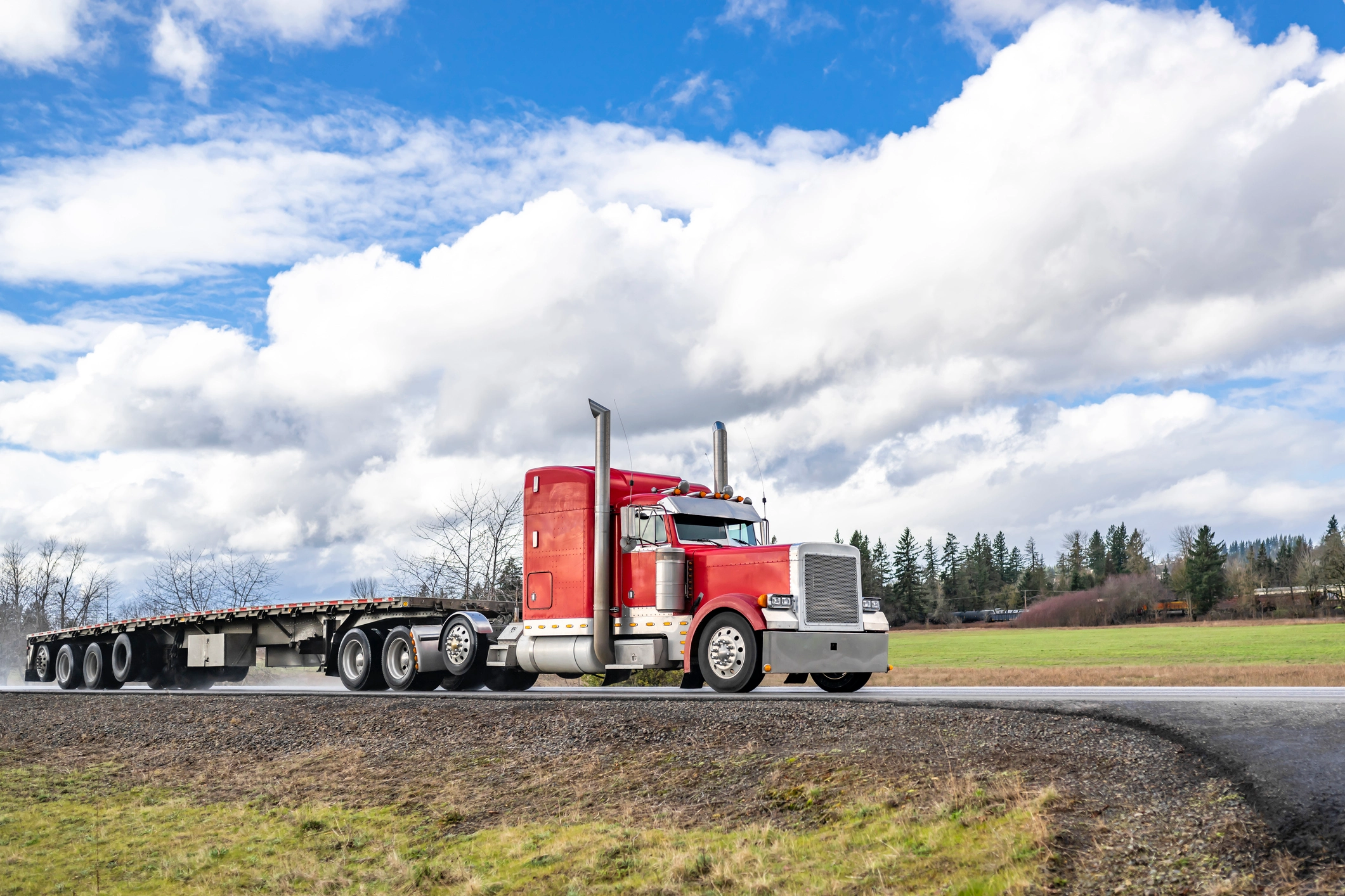 Red truck on rural road